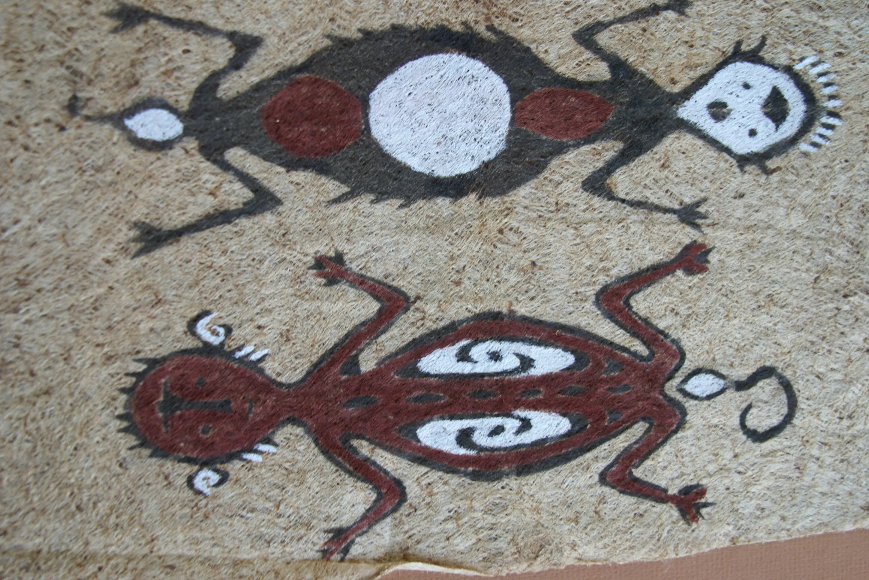 Rare Tapa Bark Cloth (Kapa in Hawaii), from Lake Sentani, Irian Jaya, Papua New Guinea. Hand painted by a Tribal Artist with natural pigments: Spiritual Stylized People Morphing into Geckos 16" x 14" (no 25)