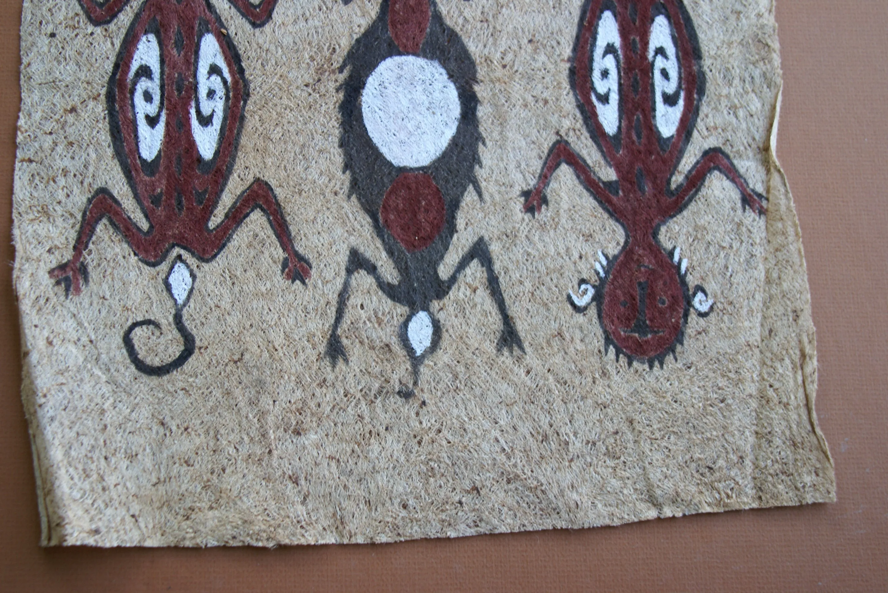 Rare Tapa Bark Cloth (Kapa in Hawaii), from Lake Sentani, Irian Jaya, Papua New Guinea. Hand painted by a Tribal Artist with natural pigments: Spiritual Stylized People Morphing into Geckos 16" x 14" (no 25)