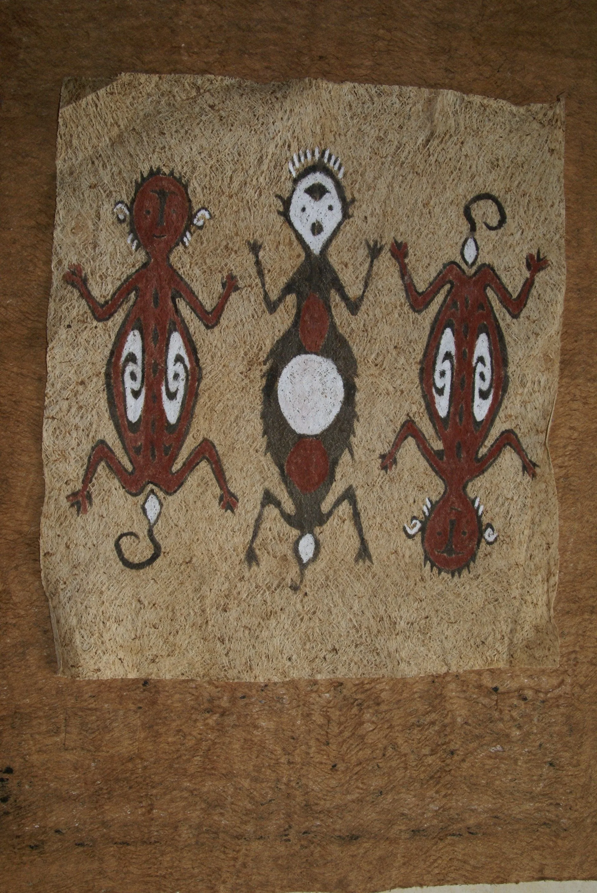 Rare Tapa Bark Cloth (Kapa in Hawaii), from Lake Sentani, Irian Jaya, Papua New Guinea. Hand painted by a Tribal Artist with natural pigments: Spiritual Stylized People Morphing into Geckos 16" x 14" (no 25)