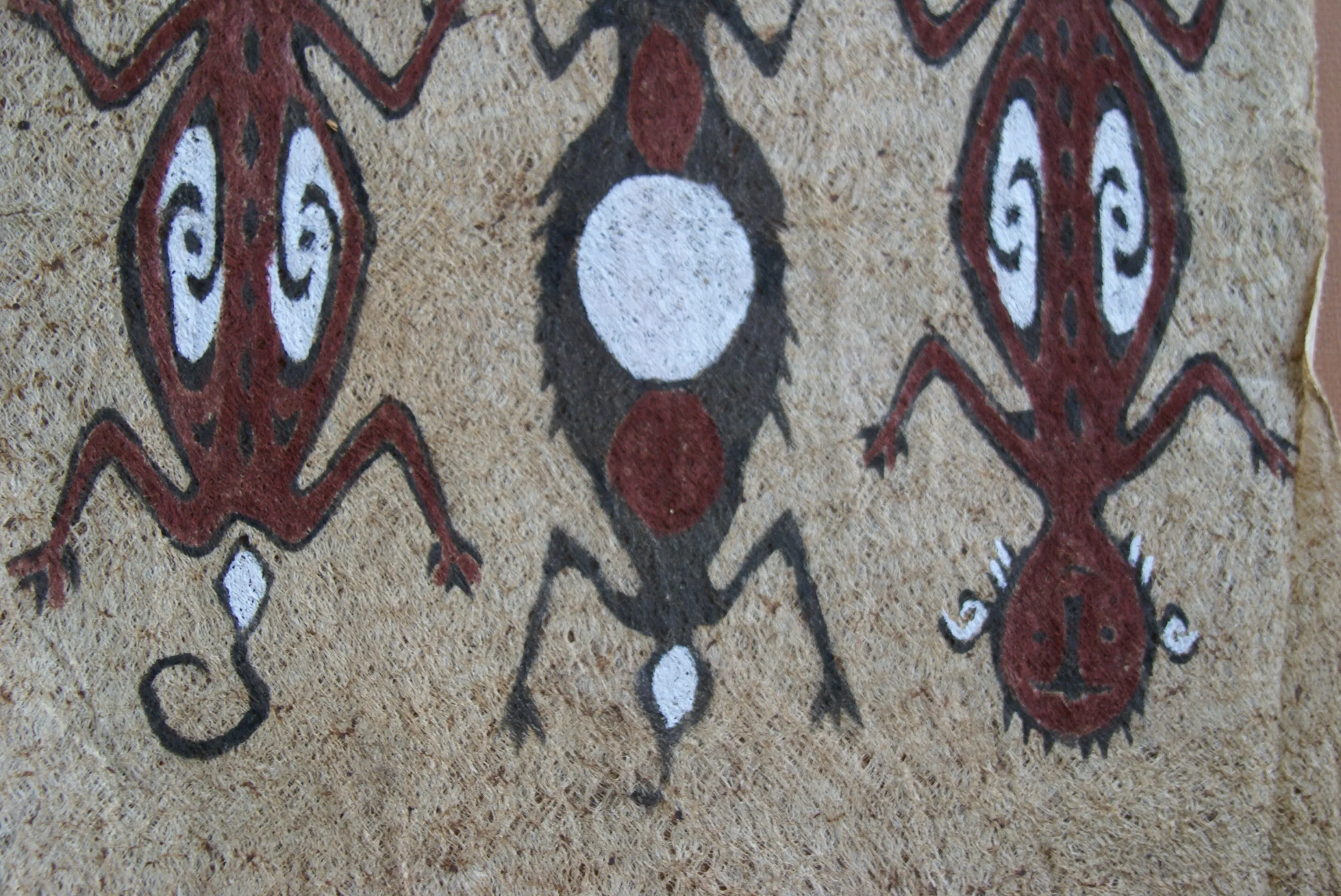 Rare Tapa Bark Cloth (Kapa in Hawaii), from Lake Sentani, Irian Jaya, Papua New Guinea. Hand painted by a Tribal Artist with natural pigments: Spiritual Stylized People Morphing into Geckos 16" x 14" (no 25)