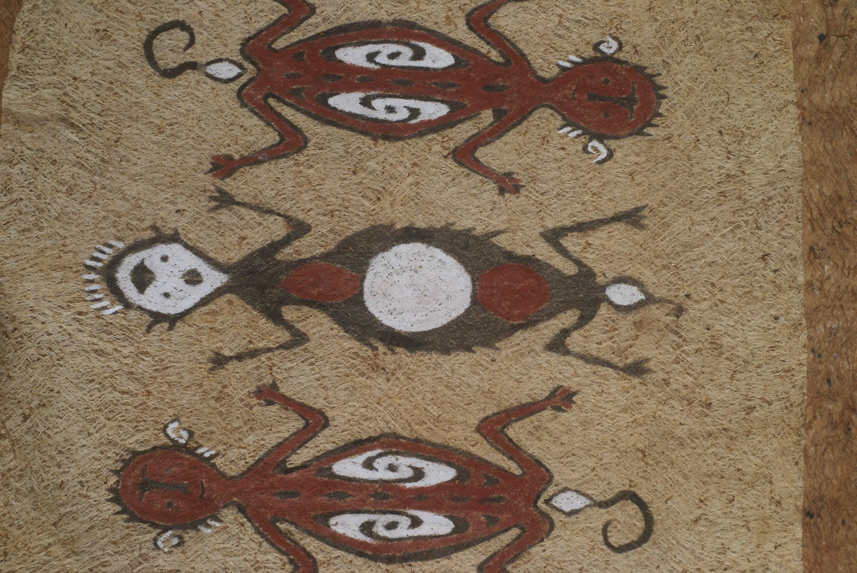 Rare Tapa Bark Cloth (Kapa in Hawaii), from Lake Sentani, Irian Jaya, Papua New Guinea. Hand painted by a Tribal Artist with natural pigments: Spiritual Stylized People Morphing into Geckos 16" x 14" (no 25)