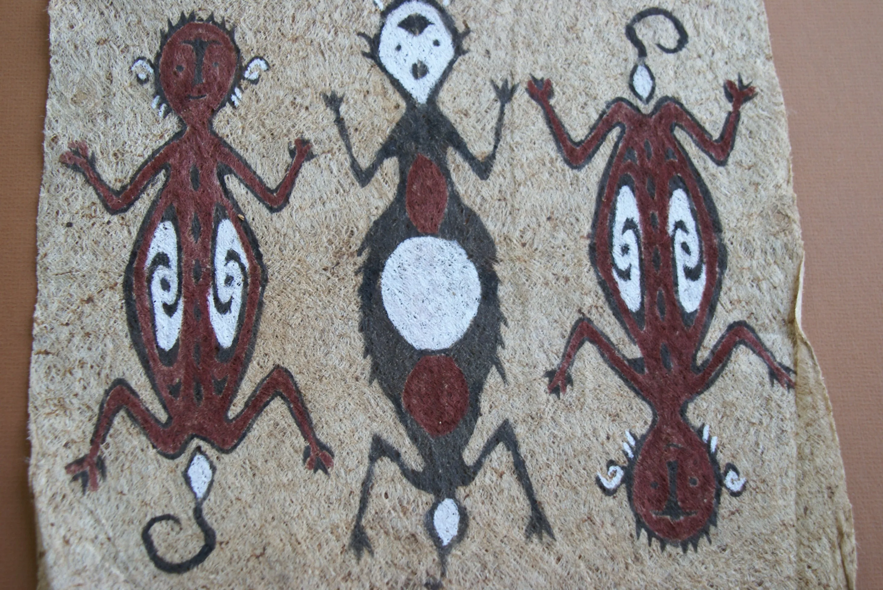 Rare Tapa Bark Cloth (Kapa in Hawaii), from Lake Sentani, Irian Jaya, Papua New Guinea. Hand painted by a Tribal Artist with natural pigments: Spiritual Stylized People Morphing into Geckos 16" x 14" (no 25)